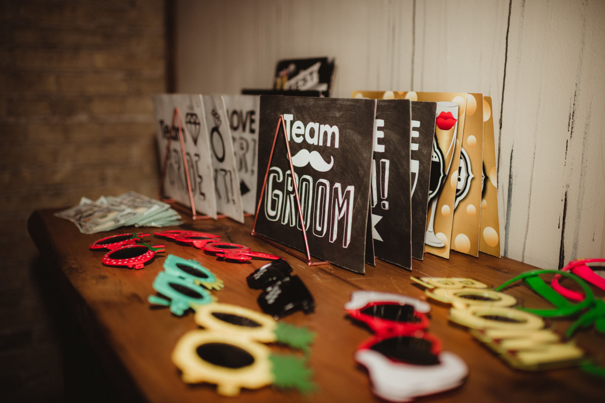 Bride and groom photo props for a wedding booth